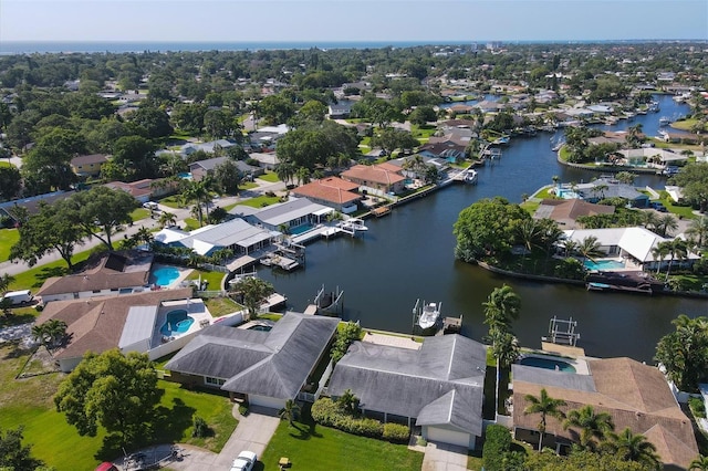 drone / aerial view with a water view