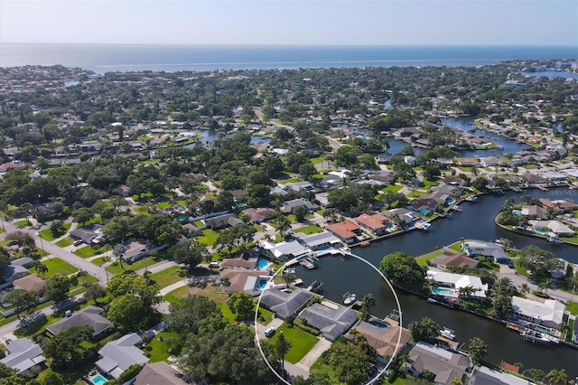 bird's eye view with a water view