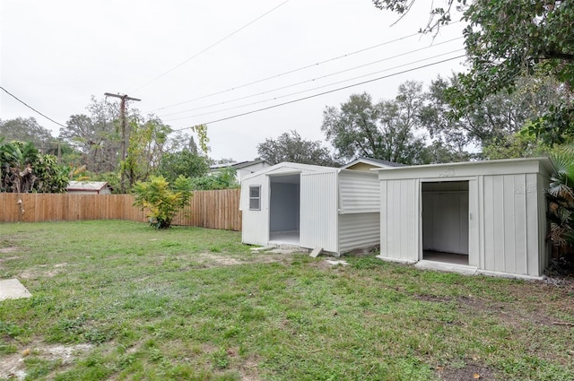 view of yard with a storage shed