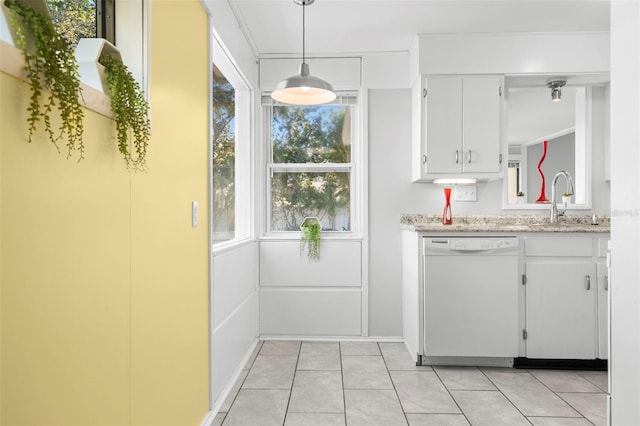 kitchen featuring sink, dishwasher, pendant lighting, light stone countertops, and white cabinets