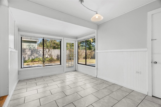 view of unfurnished sunroom