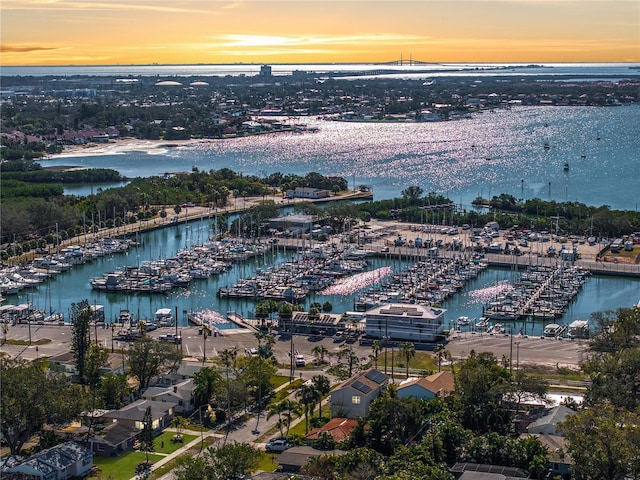 aerial view at dusk with a water view