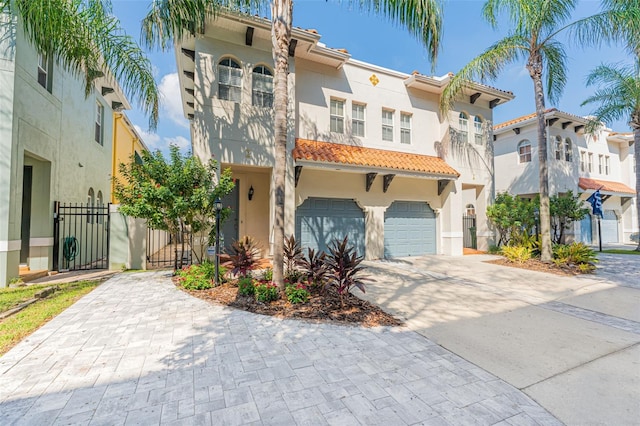 mediterranean / spanish house featuring a garage