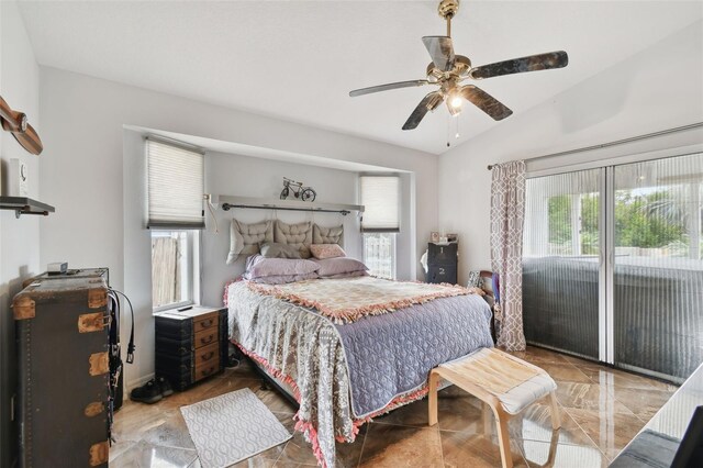 tiled bedroom with ceiling fan, vaulted ceiling, access to outside, and multiple windows