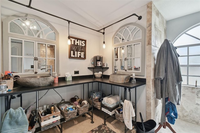 interior space featuring sink and concrete floors