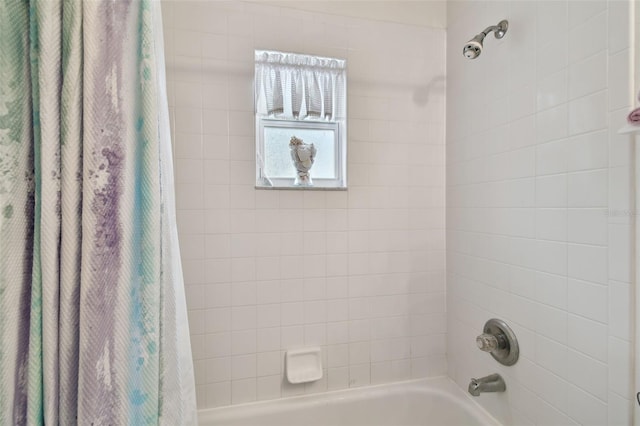 bathroom featuring shower / bath combination with curtain