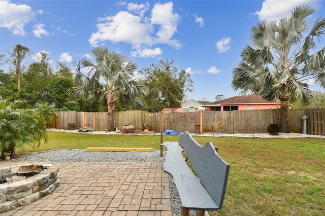 view of patio / terrace with a fire pit