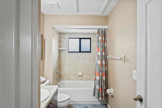 full bathroom featuring a textured ceiling, toilet, vanity, and shower / tub combo