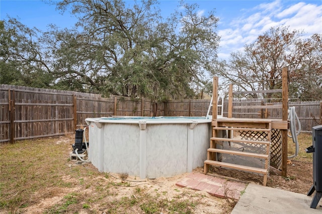 view of yard featuring a fenced in pool