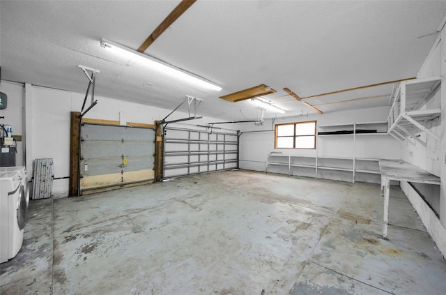 garage featuring independent washer and dryer