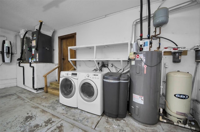 laundry area featuring independent washer and dryer and water heater