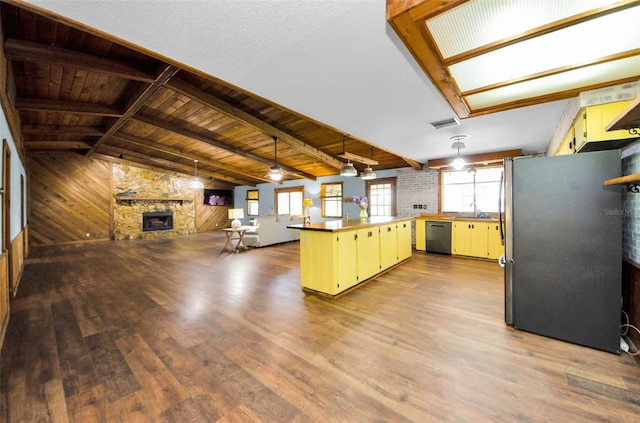 kitchen featuring kitchen peninsula, dishwashing machine, wooden ceiling, stainless steel refrigerator, and hanging light fixtures