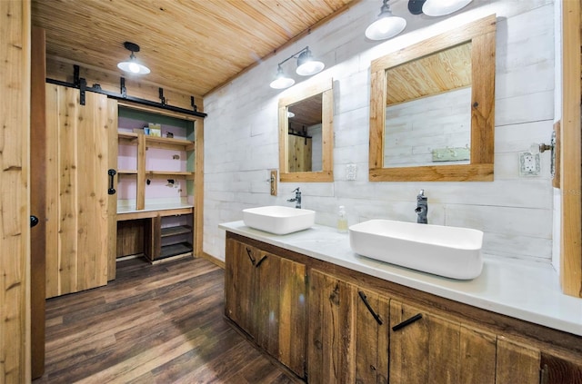 bathroom with vanity, hardwood / wood-style flooring, wooden walls, and wood ceiling