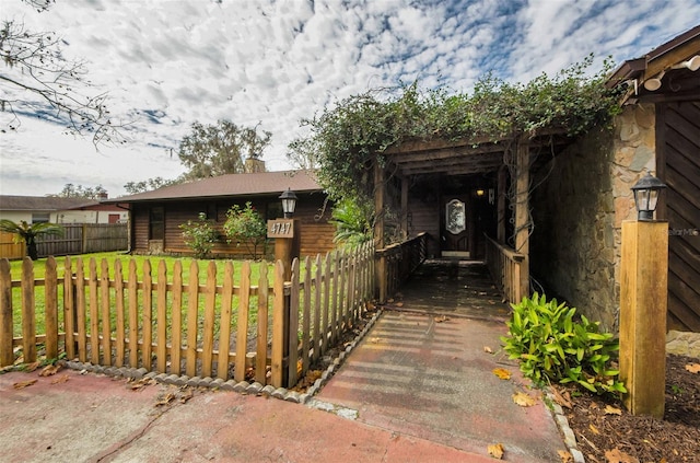 view of side of property with a yard