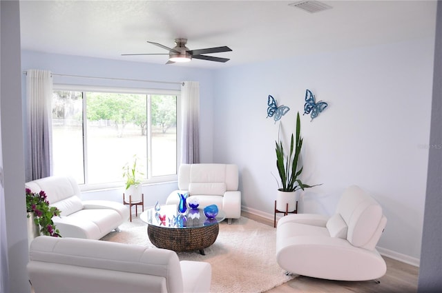 living room with ceiling fan