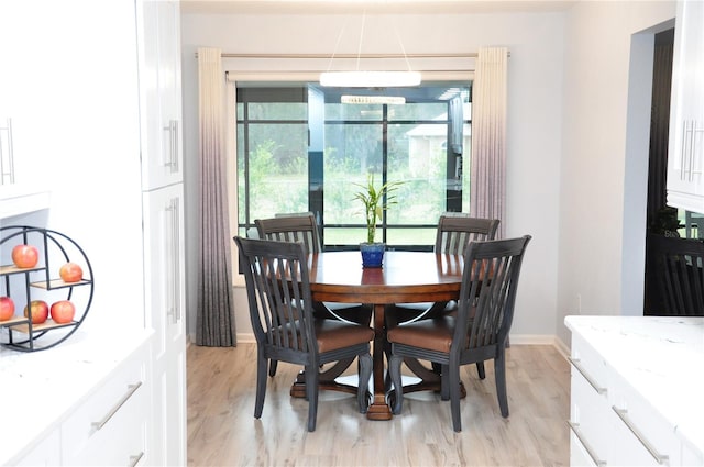 dining room featuring light hardwood / wood-style floors