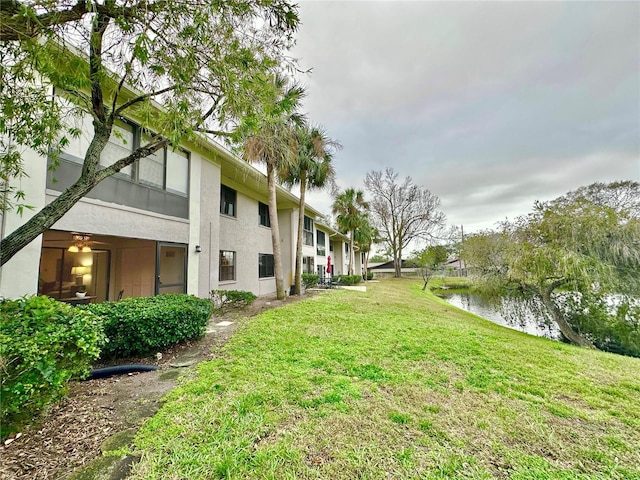 view of yard featuring a water view