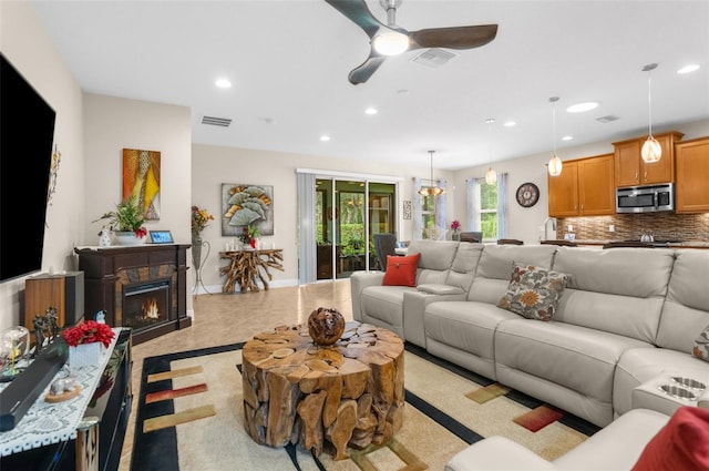 living room featuring ceiling fan