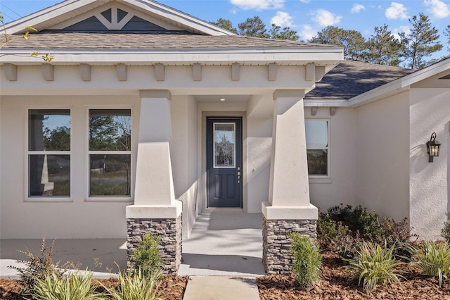 property entrance featuring a porch