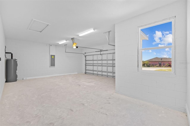 garage with electric panel, water heater, and a garage door opener