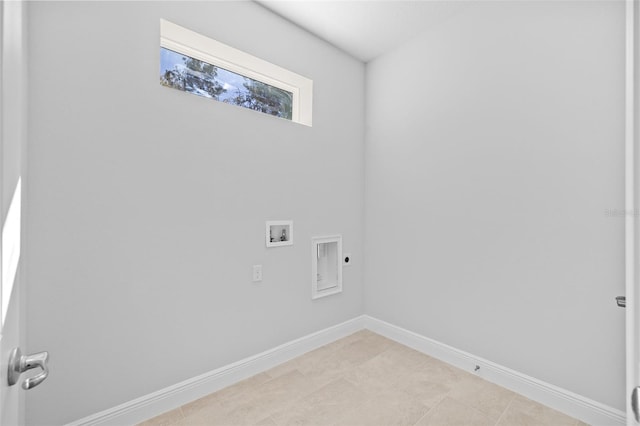 laundry area featuring electric dryer hookup and washer hookup