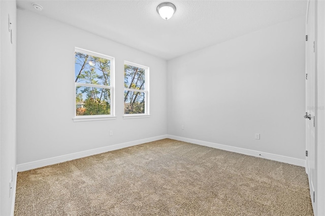 empty room with carpet floors