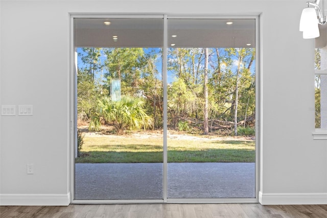 doorway featuring hardwood / wood-style flooring