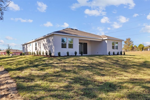 exterior space with a yard