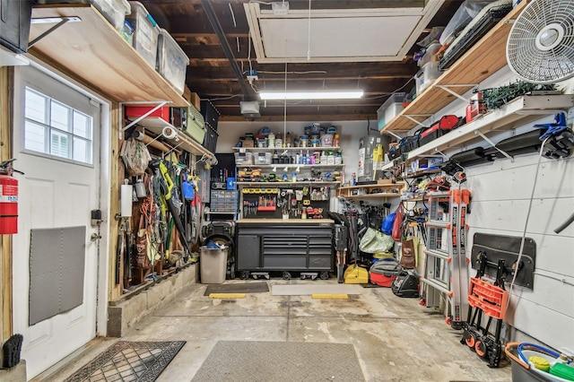 garage with a workshop area