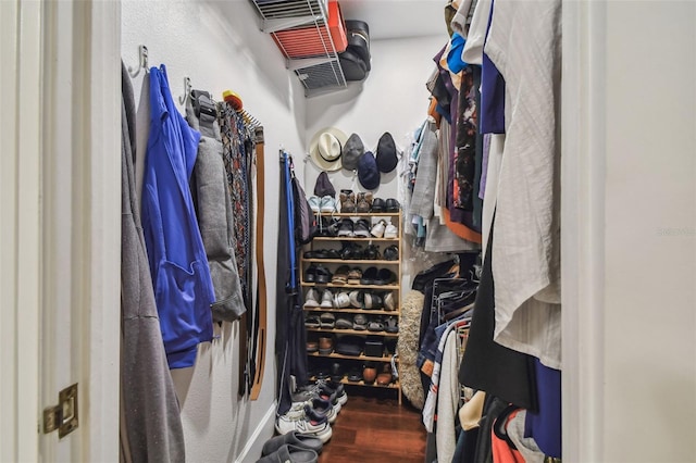 spacious closet featuring wood finished floors