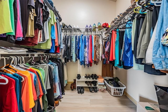 walk in closet featuring wood-type flooring