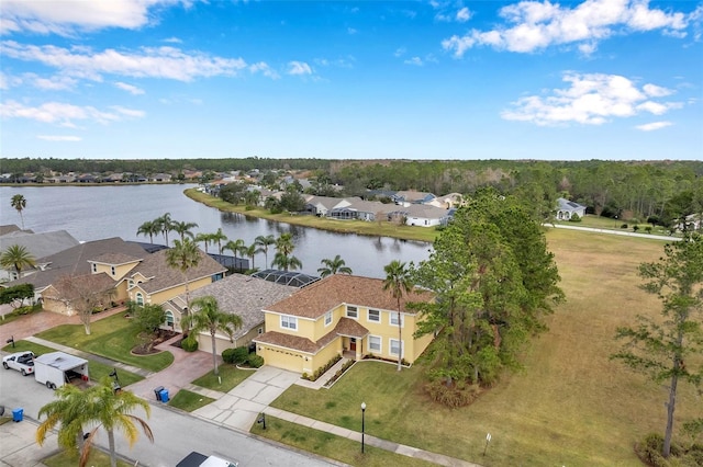 drone / aerial view with a water view