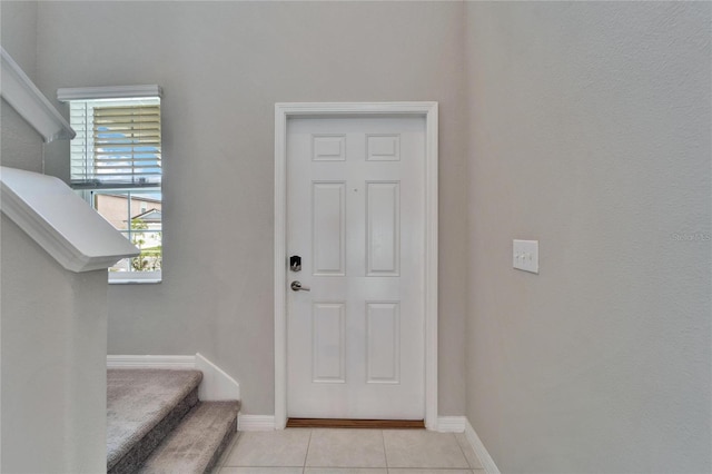 view of tiled foyer entrance