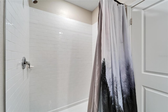 bathroom with curtained shower