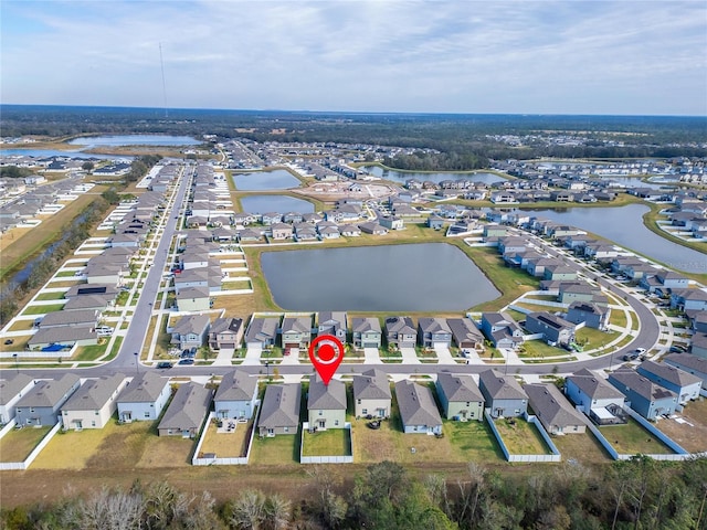 drone / aerial view with a water view