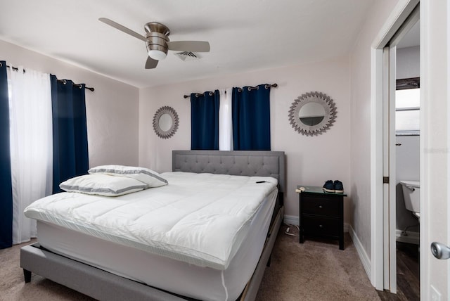 bedroom featuring light colored carpet and ceiling fan