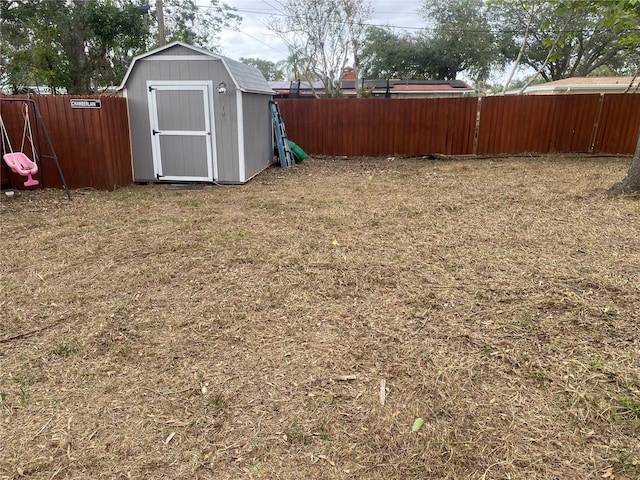 view of yard with a storage shed