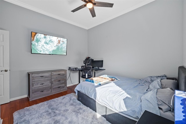 bedroom with ceiling fan, crown molding, and dark wood-type flooring