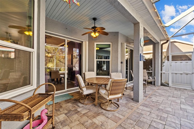 view of patio featuring ceiling fan