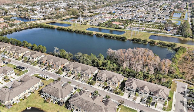 bird's eye view with a water view