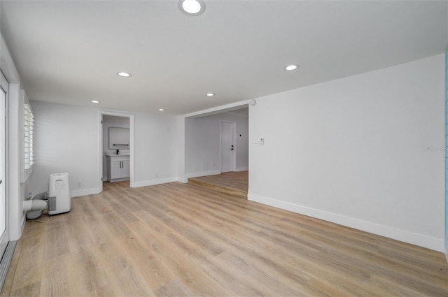 empty room with light wood-type flooring