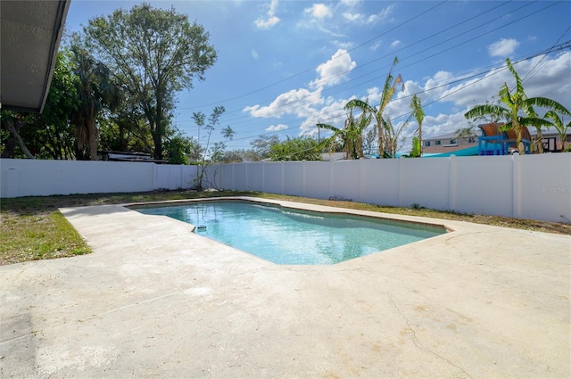 view of pool featuring a patio area