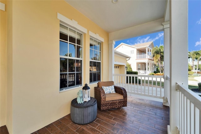 balcony featuring a porch