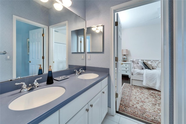 bathroom featuring vanity and tile patterned floors