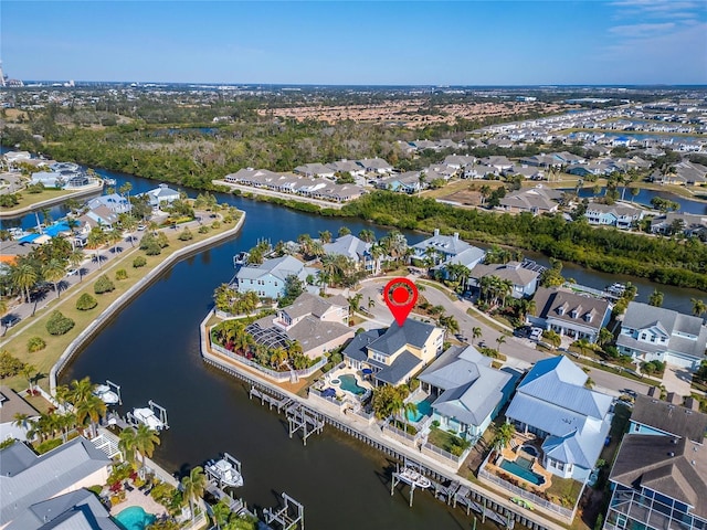 drone / aerial view featuring a water view