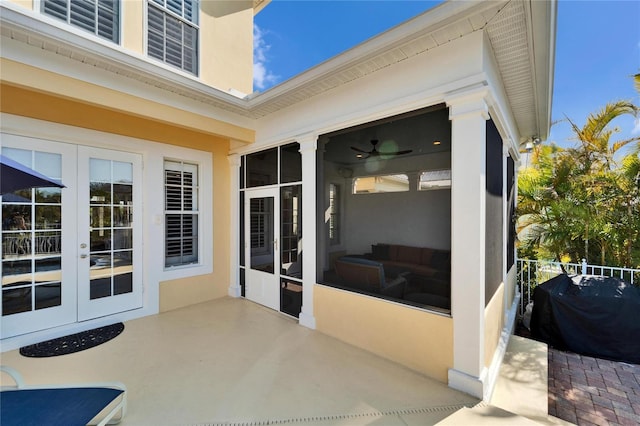 view of patio / terrace with ceiling fan, grilling area, and french doors