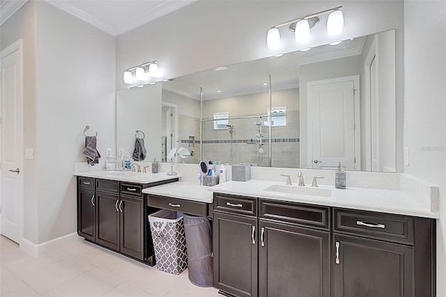 bathroom with tile patterned flooring, vanity, ornamental molding, and tiled shower