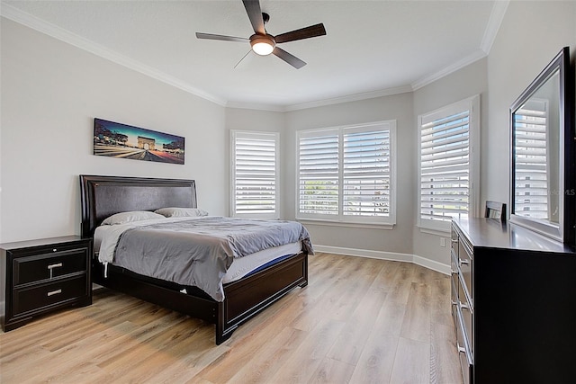 bedroom featuring ceiling fan, light wood-type flooring, and ornamental molding