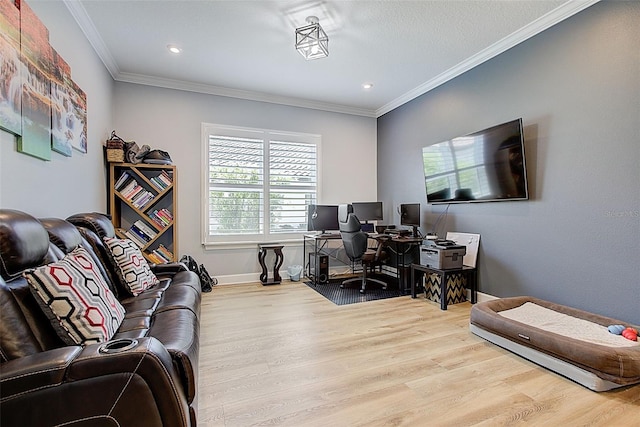 office space with light hardwood / wood-style flooring and crown molding