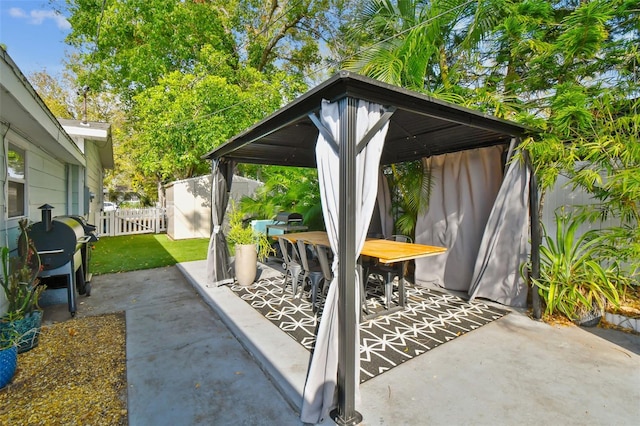 view of patio / terrace with a gazebo and grilling area